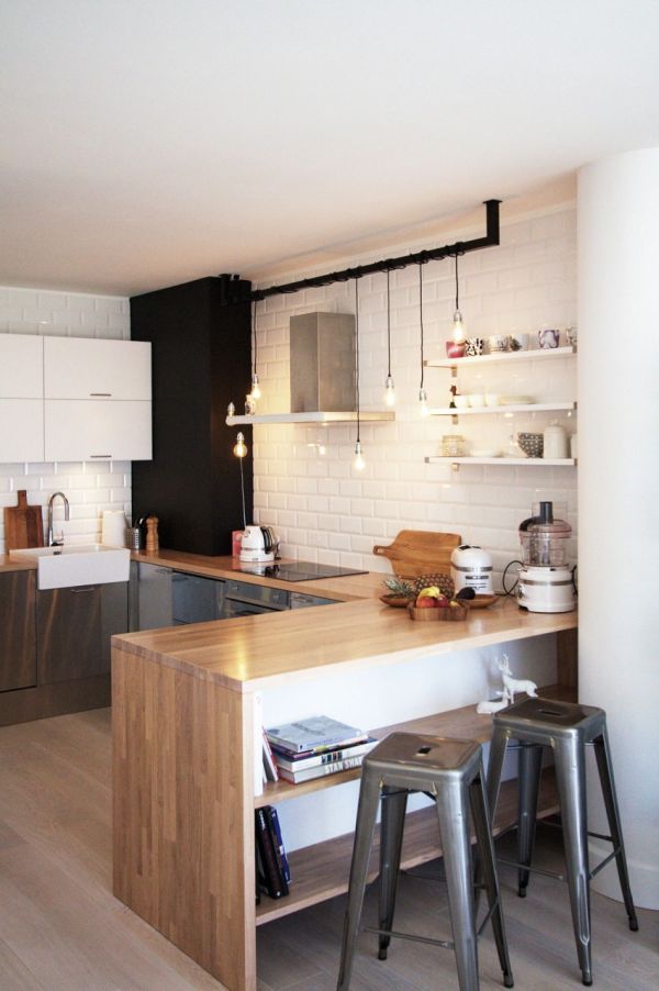 Scandinavian in Warsaw subway tiles cords lighting